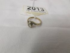 A 9ct gold and diamond ring, size H.