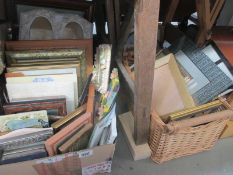 A box and basket full of picture frames etc.