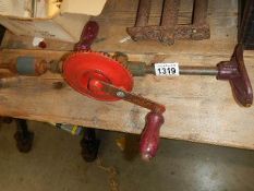 An old hand drill,.