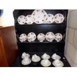 A Queen Anne bone china tea set and Paragon and diamond trio's