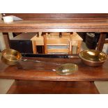 A copper/brass warming pan,