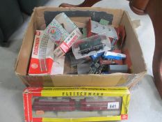 A boxed Fleischmann HO international train and other trains and accessories