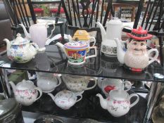 12 collectors teapots including Masons, Broadhurst, Kathie Winkle etc.