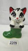 A Lorna Bailey Pottery 'Cat in Boot', 13 cm tall, signed to base.