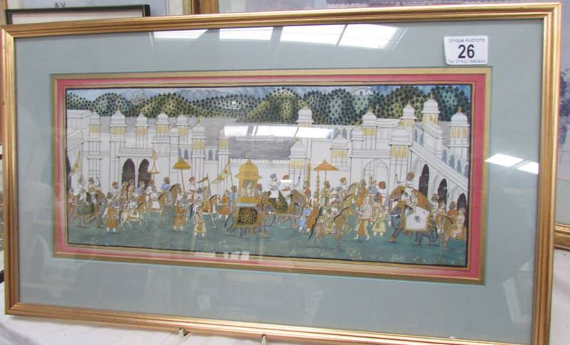 A framed and glazed print of an Indian procession, image 40 x 16, frame 55 x 32.