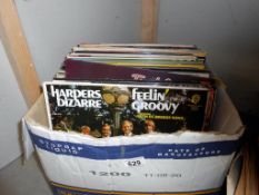 A box of LP records including Odyssey, Frank Sinatra, Bacharach & some orchestral etc.