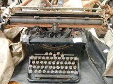 An L C Smith Corona typewriter.