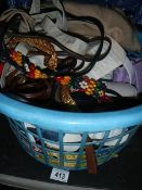 A basket of scarves, belts etc.