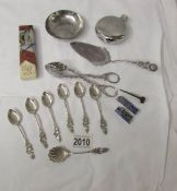 7 (800) continental silver spoons, an Islay malt whisky flask, a Barrowdale metal dish, cake slice,
