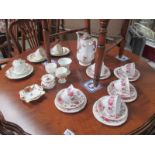 A Royal Albert American Beauty coffee pot and 5 sets of Queen Anne serenade trio's and other cups