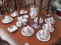 A Royal Albert American Beauty coffee pot and 5 sets of Queen Anne serenade trio's and other cups