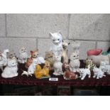 A quantity of cat figures etc.