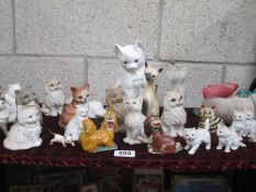 A quantity of cat figures etc.