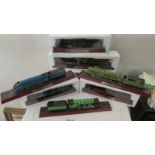 5 boxed and 3 unboxed ornamental model locomotives.