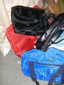 A large quantity of holdalls etc.