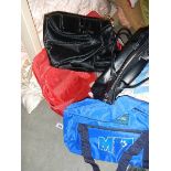 A large quantity of holdalls etc.