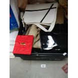 A good lot of hand bags. ****Condition report**** Red bag has some marks from use.