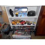 A quantity of old toys including 2 pairs roller skates, pool game with cue, diecast, K'nex,