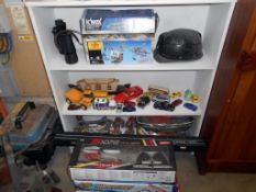 A quantity of old toys including 2 pairs roller skates, pool game with cue, diecast, K'nex,