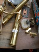A mixed lot of old brassware including picture light, switch plates etc.