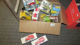 A quantity of boxed die cast models and some empty boxes.