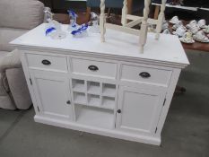 A modern white finish cupboard/sideboard with drawers and cupboards and wine rack 125cm x 50cm x