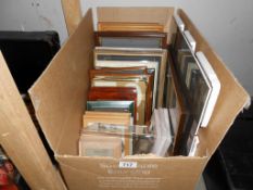 A box of assorted picture frames