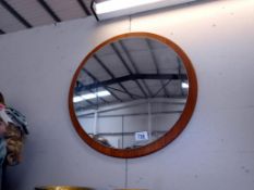 A retro round mirror on teak surround Diameter 48cm ****Condition report**** In good