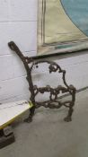 An ornamental left side only cast bench end.