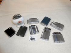 A quantity of 9 vintage lighters including 7 Ronson