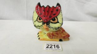A Lorna Bailey Pottery 'Tiny Hootie the Owl', 10 cm tall, signed to base.