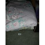 A quantity of good quality bed covers.