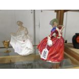 2 Royal Doulton figurines 'Tracy' Hn2736 and Autumn Breezes HN 1934.