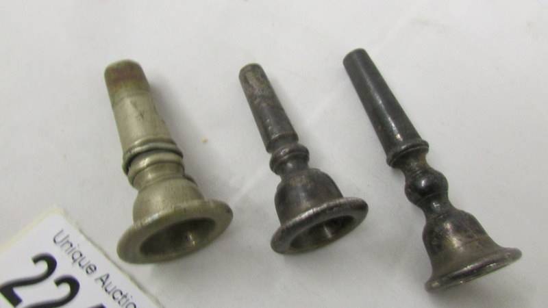 3 musical instrument mouth pieces including one marked Besson & Co., prototype.