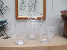 A Port Meirion glass water jug and 4 matching glasses, Jug height 25cm, glass height 14.25cm approx.