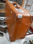 An old leather suitcase.