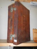 A good quality leather suitcase with initials E.J.R.