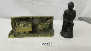 Two pieces of coal mining memorabilia, one a figure of a miner made from British coal,