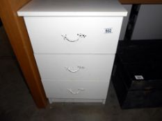 A white melamine 3 drawer bedroom bedside chest of drawers