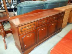 A modern dark wood stained 3 drawer 4 door sideboard 162cm x 45cm x height 76cm