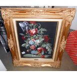 A gilt framed woolwork tapestry of flowers by Phillipa Eminson 1987 58cm x 67cm,
