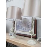 A lovely pair of decorative 'Rose' table lamps in antique cream finish (1 shade has some slight