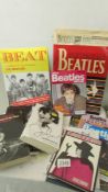 A mixed lot of Beatles books and magazines.