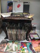 A large lot of 45's singles including Rolling Stones, Elton, Bob Marley, Neil Diamond,