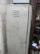 A vintage metal storage locker