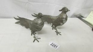 A pair of silver plate pheasants.