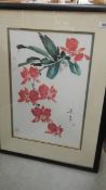 A Chinese signed framed and glazed floral print. 71.5 x 97.5 cm.