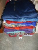 A large quantity of men's shirts.