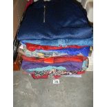 A large quantity of men's shirts.