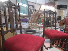 A set of 4 Edwardian oak dining chairs with bobbin turned spindles (1 a/f)